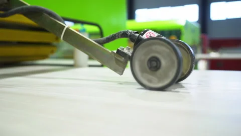 Lamination machine adjusts pressure of rubber rollers automatically Stock Footage 304389122