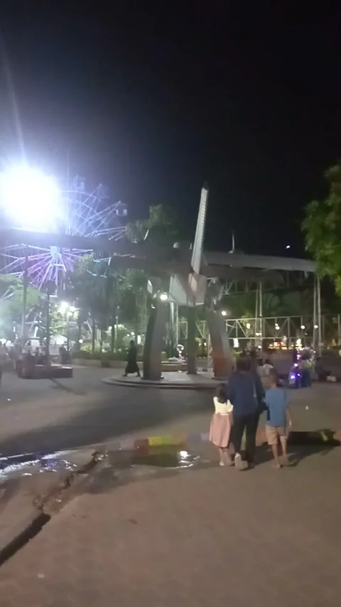 Lamongan East Java Indonesia. City park and Ferris wheel On May 6 2025 Stock Footage 313256938