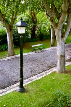 Lamp and bench Stock Photos