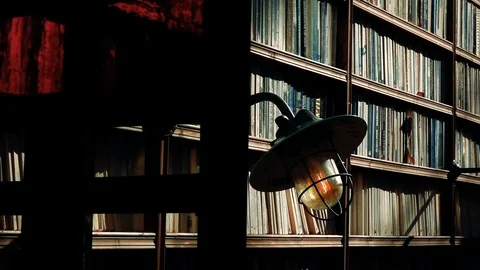 Lamp and the Books in Library 2 Stock Footage 119135107