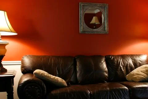 Lamp and the couch Stock Photos