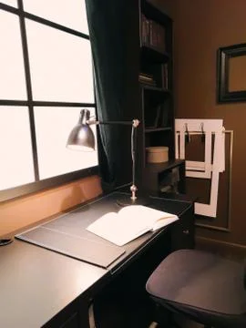 Lamp and notebook on table in the living room Stock Photos
