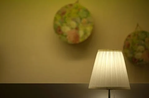 Lamp and plates in a lobby Stock Photos