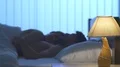 The lamp on the background of a couple in the bed. night time 4k or 4k+ Resolution