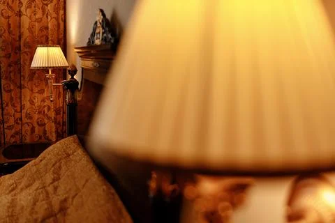 A lamp that is on a bed Stock-Fotos