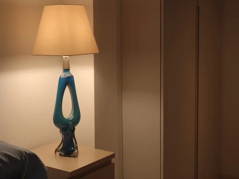 Lamp on bedside table  on/off Stock Footage 80641822