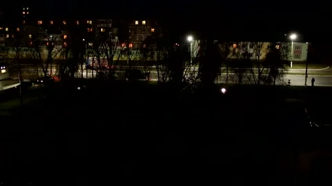 A lamp blinks in the night city Stock Footage 136737769