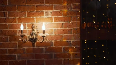 A lamp on a brick wall in a restaurant. Stock Footage 146046946