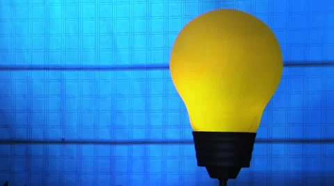 Lamp Bulb with effects of light turns on... | Stock Video | Pond5