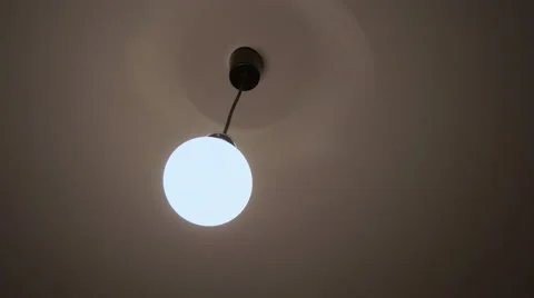 Lamp on ceiling moving by itself 001 Video stock 42889755