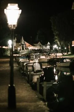 Lamp at the docks in a small town Stock Photos