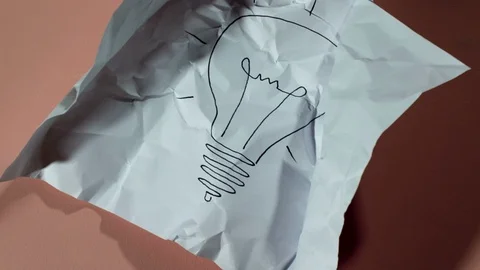 Lamp drawing on paper unwrapping stop motion Stock Footage 88696502