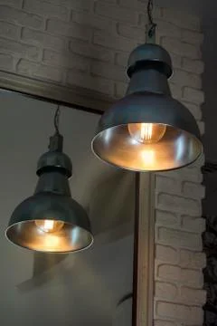 Lamp in front of a mirror Stock Photos