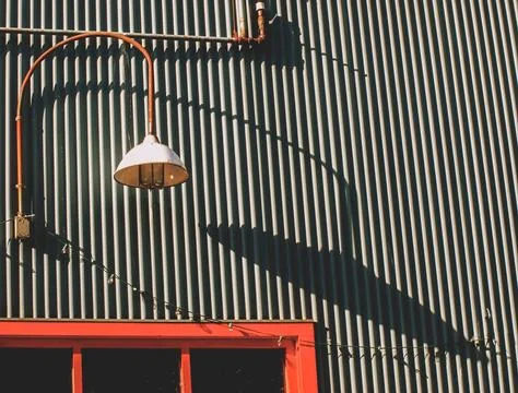 A lamp at front of store Stock Photos