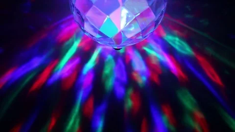 Lamp glows in colored light and rotates Stock Footage 83236958