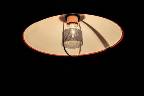 Lamp hanging from the ceiling with the black background Stock-Fotos