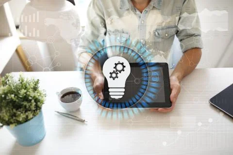Lamp icon on virtual screen. Business solution. Innovation concept. 库存照片