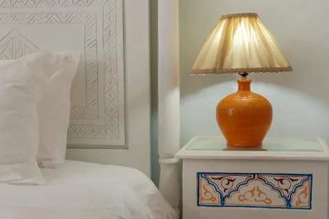 Lamp on a nihgtstand Stock Photos