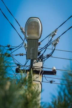 Lamp over Blue Sky Stock Photos