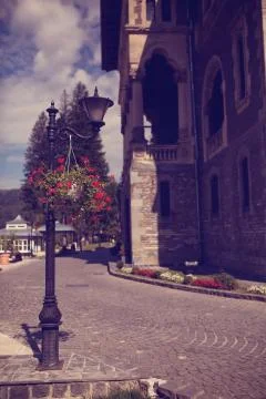 Lamp on pathway to castle Stock Photos