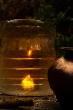 A lamp placed in a covered place to avoid wind Stock Photos