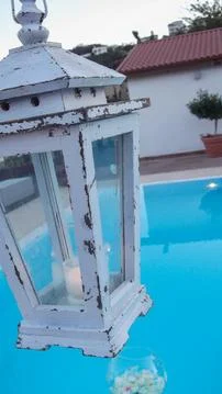 A lamp by the pool Stock Photos