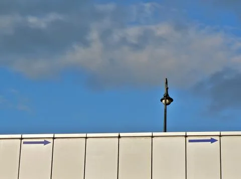 Lamp post and arrows Foto stock