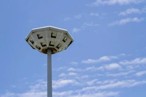 Lamp post of octagon it old have rusty with blue sky Stock Photos