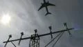 Lamp post, plane taking off HD Footage