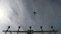 Lamp post, plane taking off HD Footage