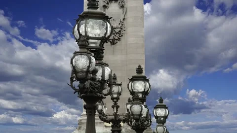 Lamp posts on Alexander III Bridge against the clouds. Paris, France Stock Footage 252189419