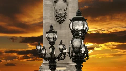 Lamp posts on Alexander III Bridge against the sunset. Paris, France Stock Footage 264943939