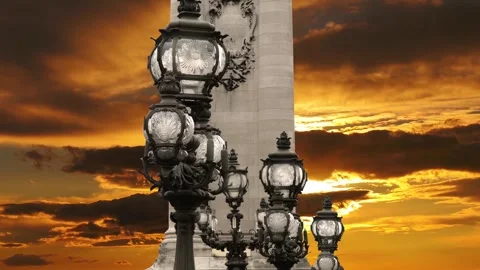 Lamp posts on Alexander III Bridge against the sunset (with zoom). Paris, France Stock Footage 265842941
