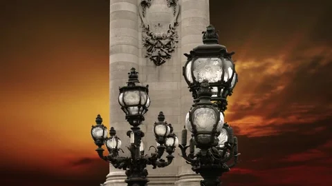 Lamp posts on Alexander III Bridge against the sunset (with zoom). Paris, France Stock Footage 265842982
