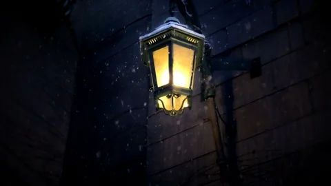 Lamp with snow falling in winter night Stock Footage 117219858