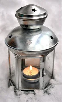 Lamp in the snow Stock Photos