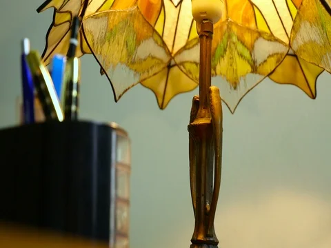 Lamp with stained glass on table Stock Footage 71527210