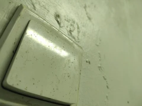Lamp Switch on White Wall Stock Photos