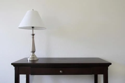 Lamp on table Stock Photos