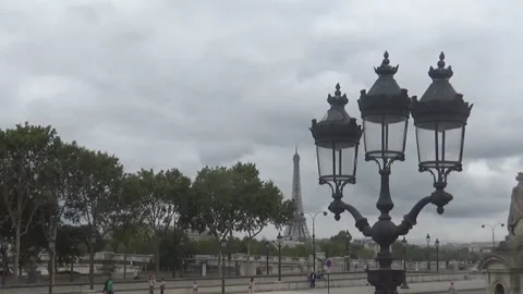 Lampost, cloudy sky and Eiffel tower, Paris, France Stock Footage 98261852