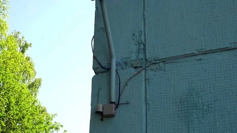 A lamppost on the background of trees and blue sky Stock Footage 75446791