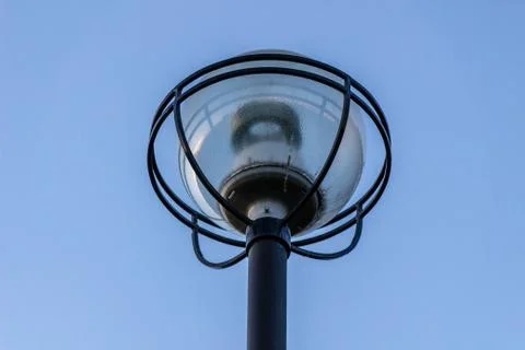 Lamppost on the blue sky background Foto stock