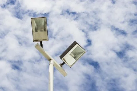 Lamppost  on cloud sky Stock Photos