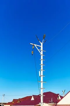 Lamppost with a hook attached to it for lifting cargo Stock Photos