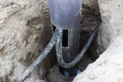Lamppost with open hole. Inside is a power switch and electrical cables. Elec 스톡 사진