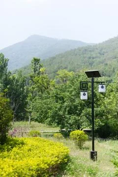 Lamppost powered by a solar panel in a mountain landscape in Chi 写真素材