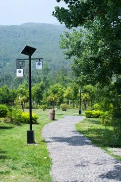 Lamppost powered by a solar panel in a mountain park in China 스톡 사진