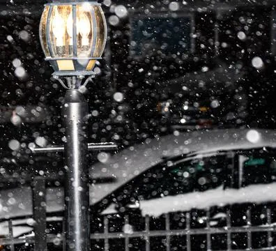 Lamppost in the Snowstorm Stock Photos