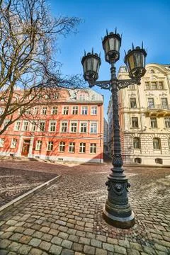 A lamppost with three lamps. Stock Photos