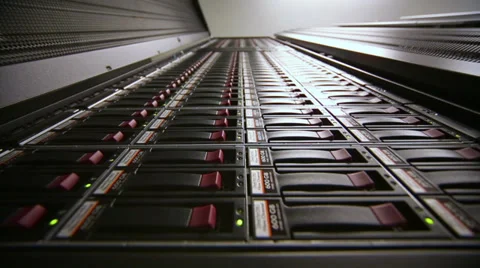Lamps blink in data server with multiple hard drives at big rack Stock Footage 31209925